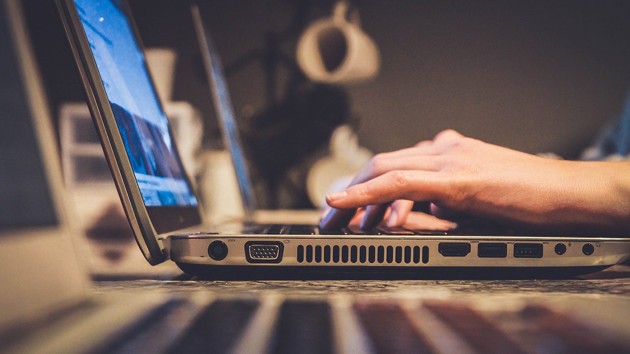 A woman working on a laptop