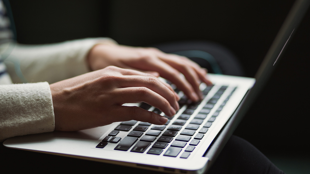 Working with business software on a laptop